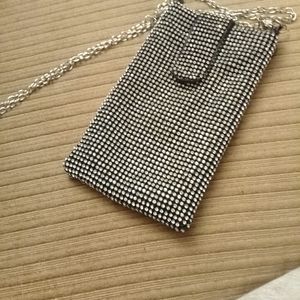 Sparkly clutch purse.